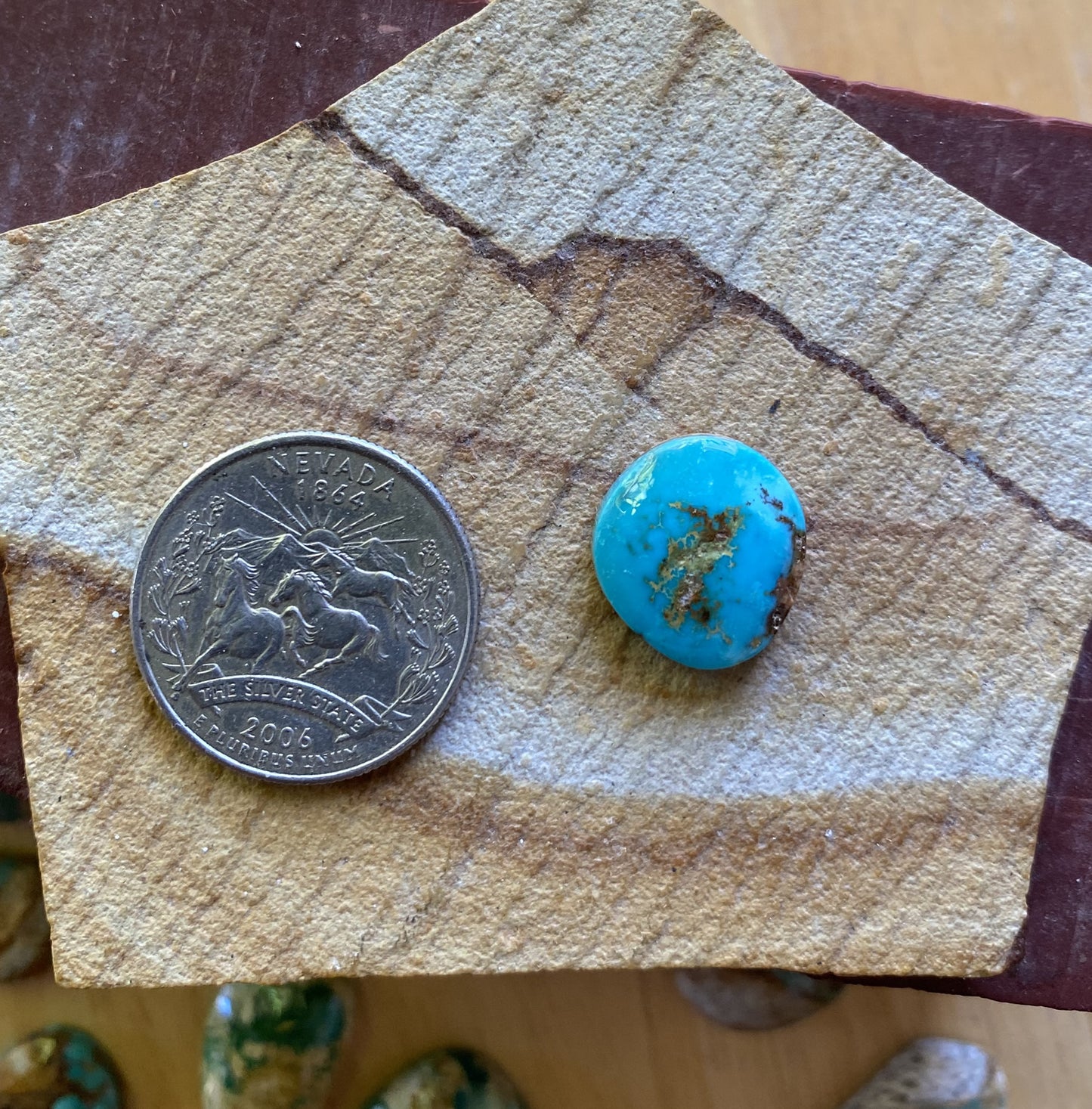 10 carat dark blue Stone Mountain Turquoise cabochon with red matrix