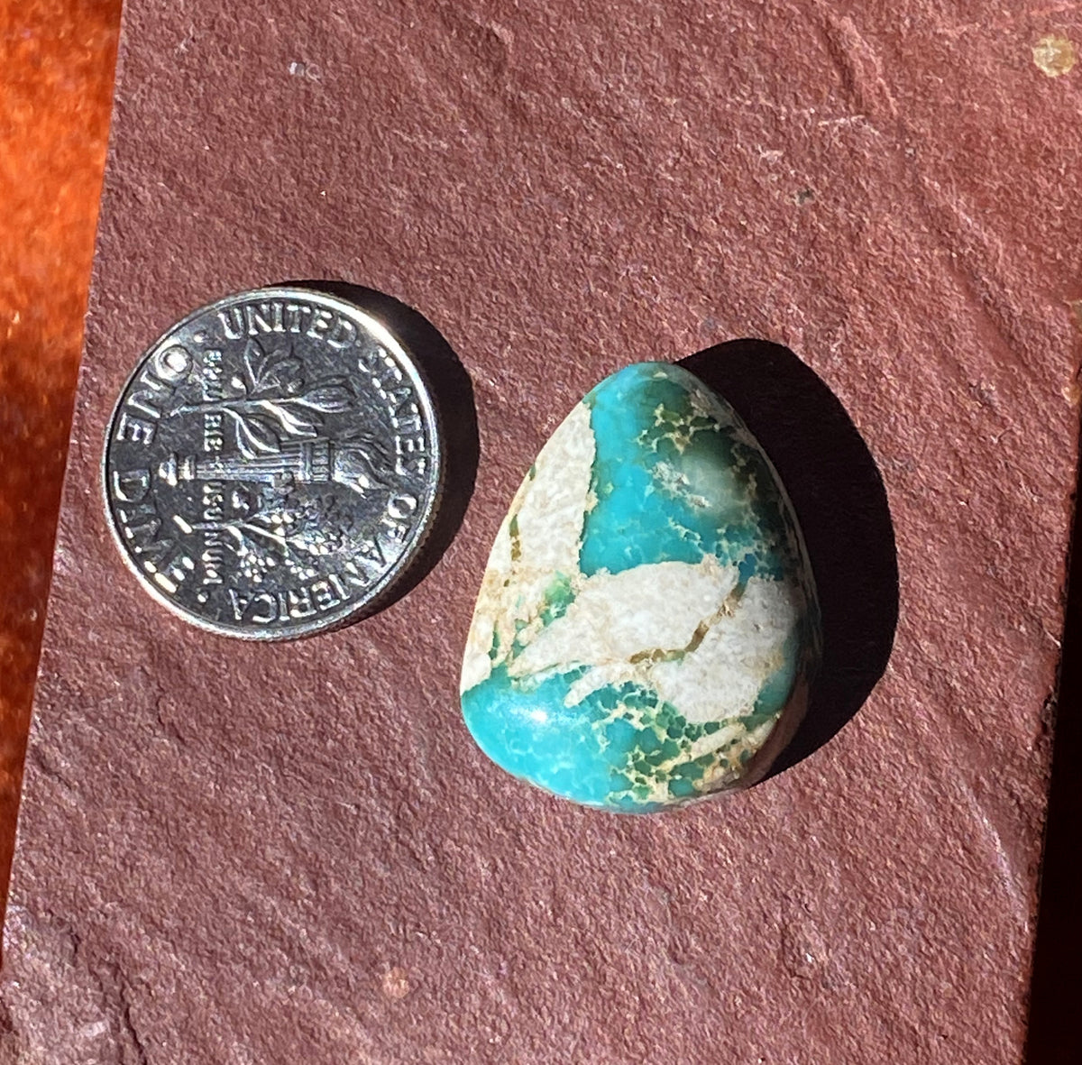 17 carat boulder-cut Stone Mountain Turquoise cabochon with a high dome