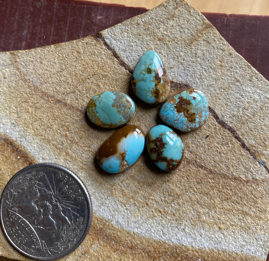 19 carat blue Stone Mountain Turquoise cabochons with red matrix 19 carat blue Stone Mountain Turquoise cabochons with red matrix