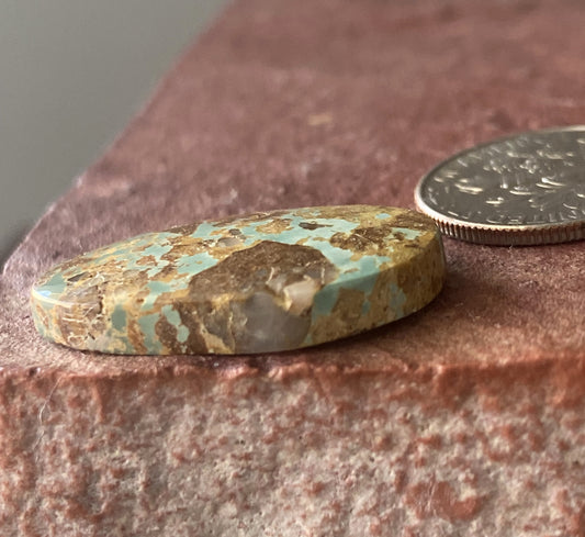 14 carat light blue Stone Mountain Turquoise cabochon with red matrix