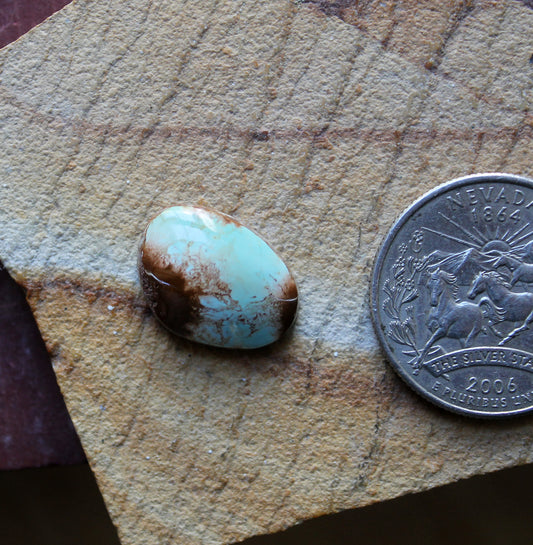 7 carat blue Stone Mountain Turquoise cabochon with red matrix 7 carat blue Stone Mountain Turquoise cabochon with red matrix