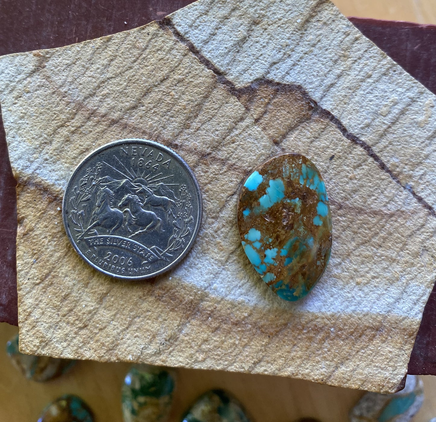 14 carat dark blue Stone Mountain Turquoise cabochon with red matrix