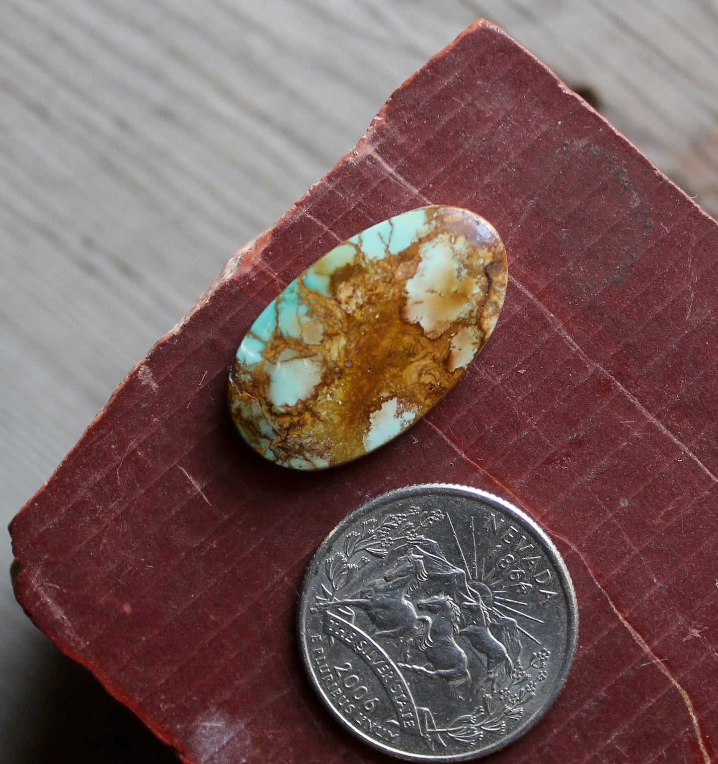 16 carat blue Stone Mountain Turquoise cabochon with red matrix