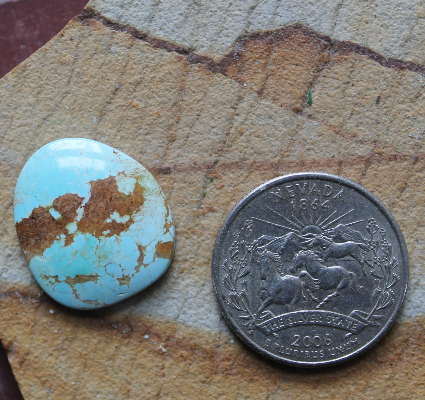 12 carat blue Stone Mountain Turquoise cabochon with red matrix