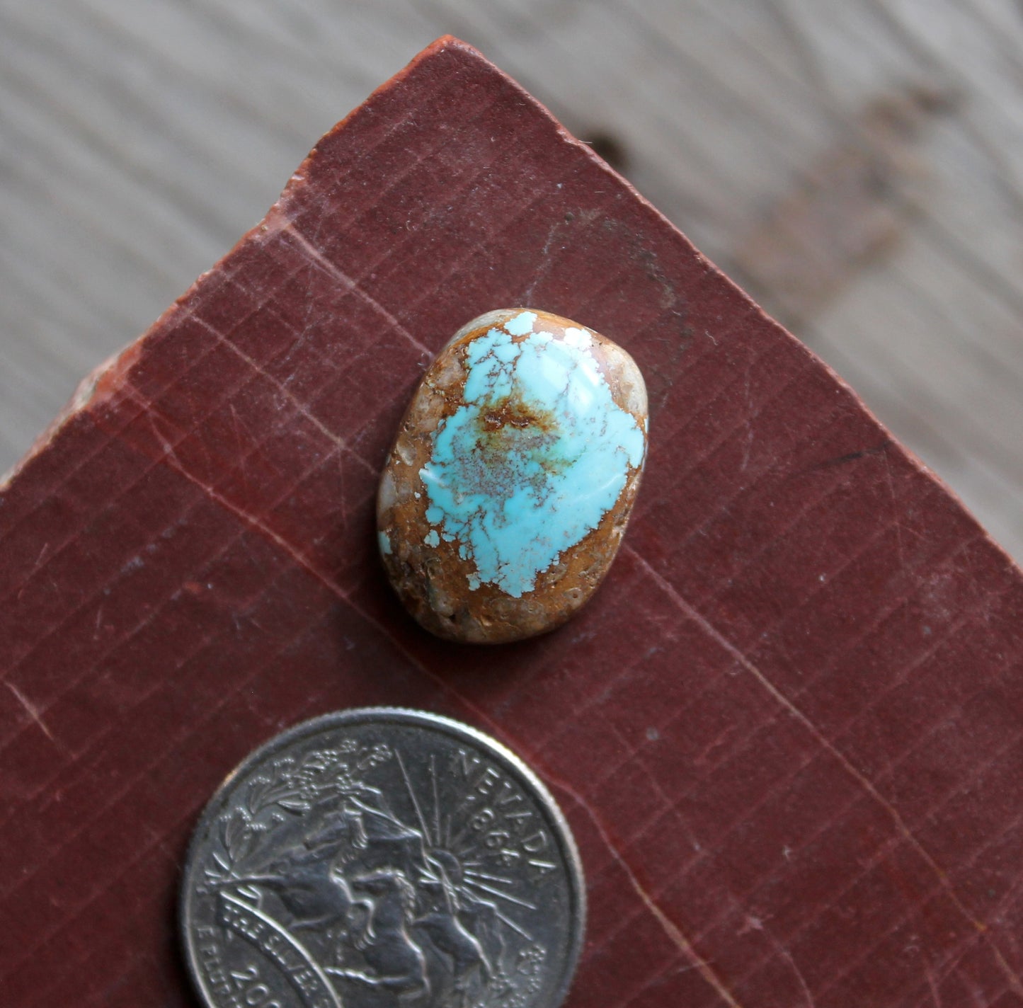 14 carat blue Stone Mountain Turquoise cabochon with red matrix