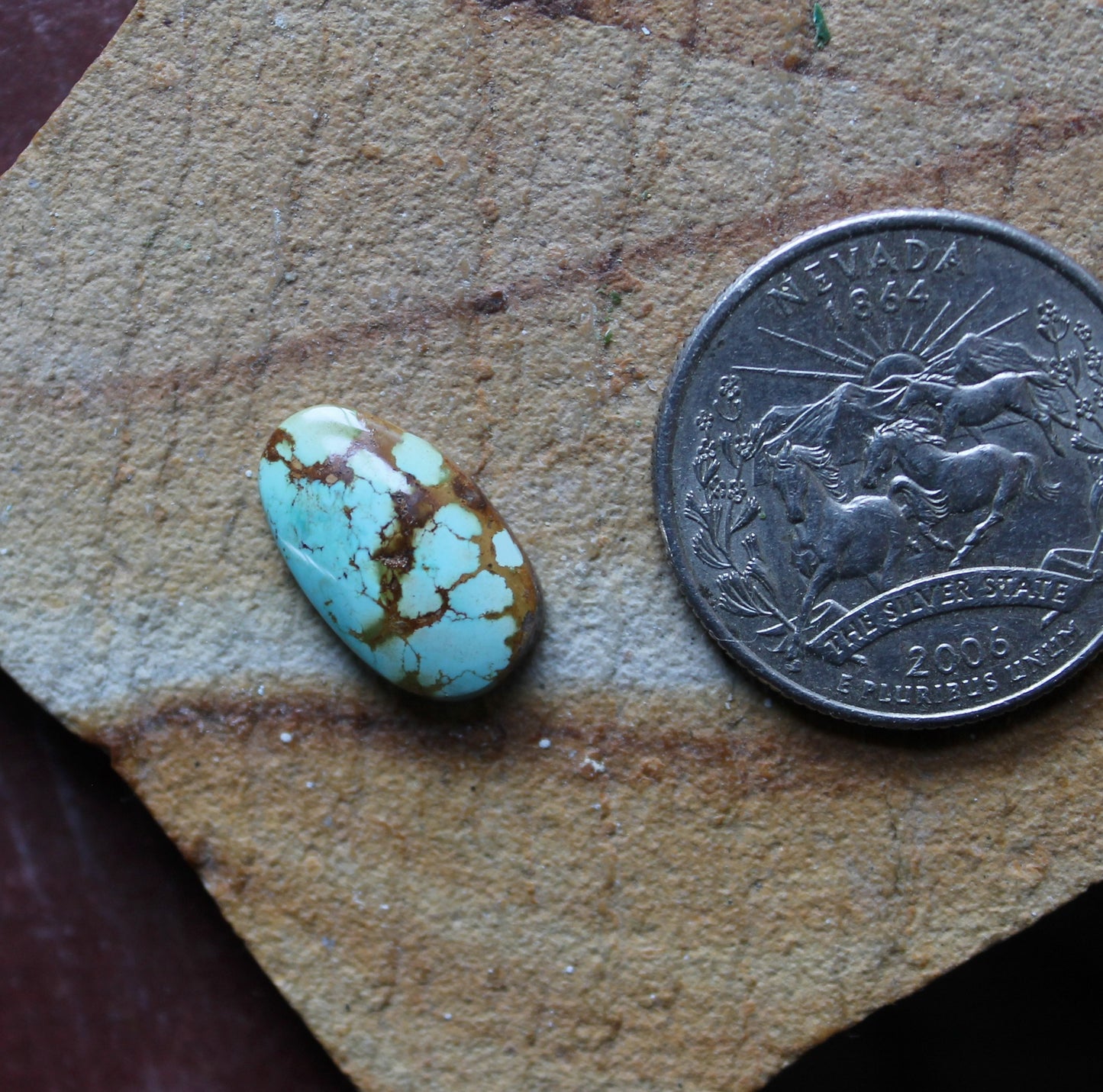 4 carat blue Stone Mountain Turquoise cabochon with red matrix