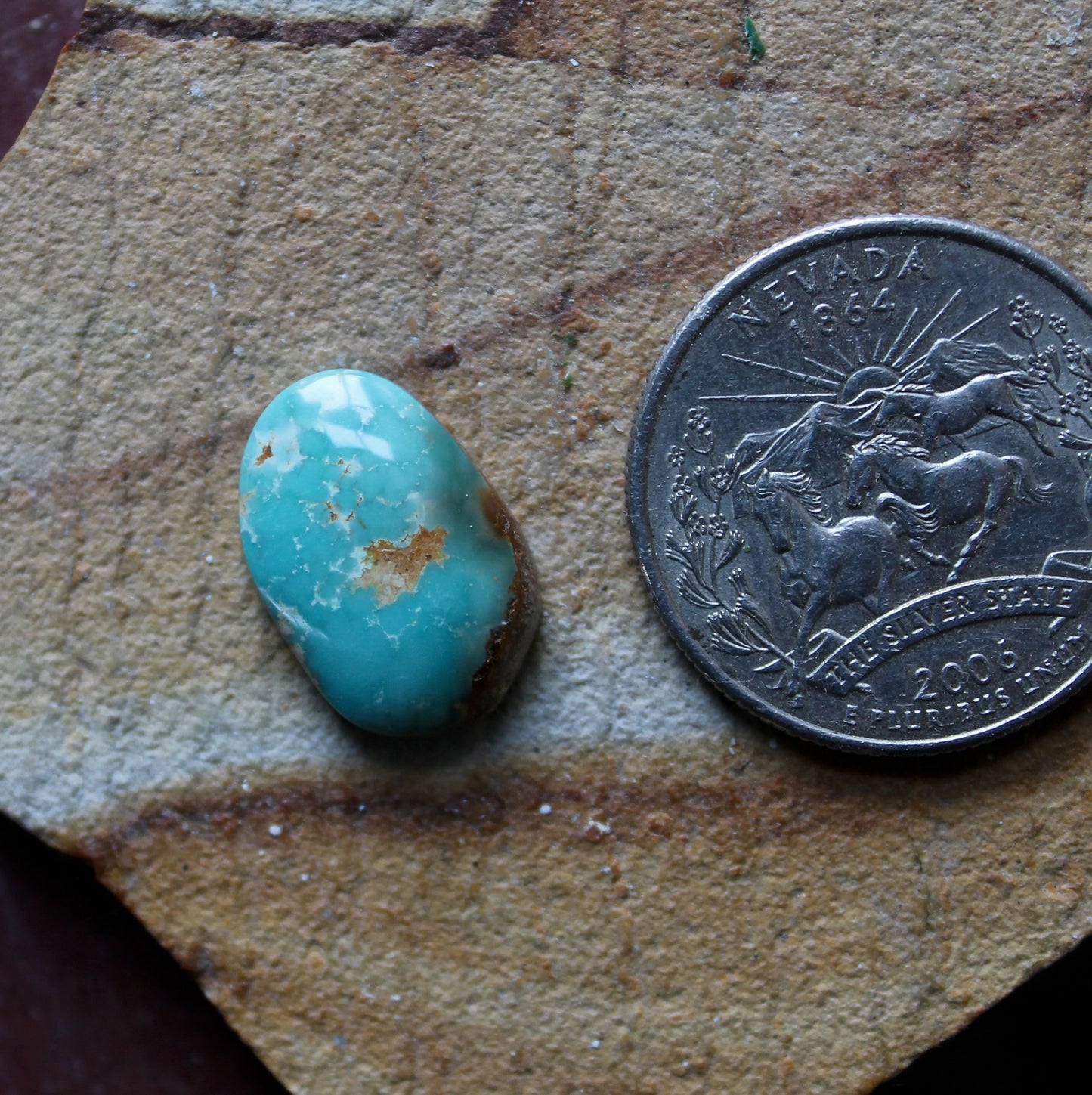 6 carat blue Stone Mountain Turquoise cabochon with red matrix