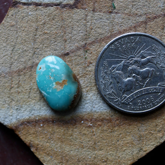 6 carat blue Stone Mountain Turquoise cabochon with red matrix 6 carat blue Stone Mountain Turquoise cabochon with red matrix