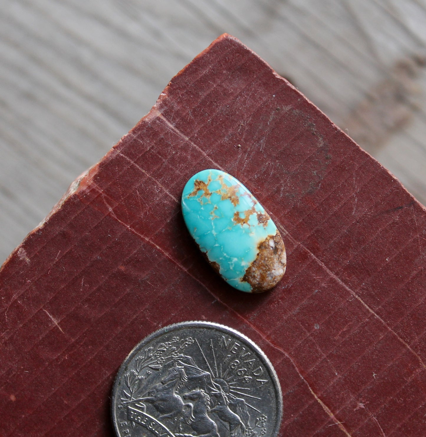 6 carat blue Stone Mountain Turquoise cabochon with red matrix