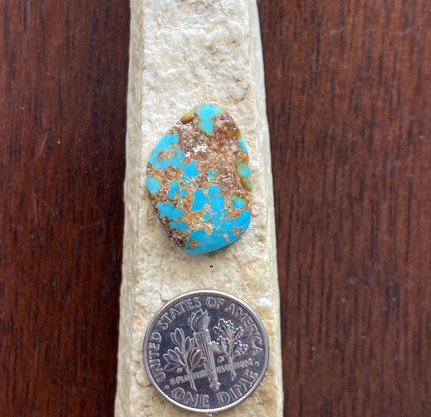 8 carat dark blue Stone Mountain Turquoise cabochon with red matrix