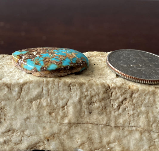 8 carat dark blue Stone Mountain Turquoise cabochon with red matrix