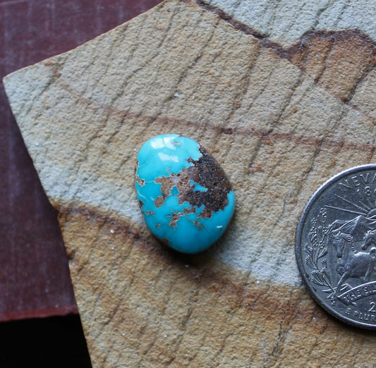 10 carat blue Stone Mountain Turquoise cabochon with red matrix
