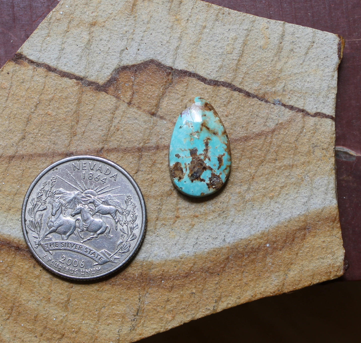 7 carat blue Stone Mountain Turquoise cabochon with red matrix