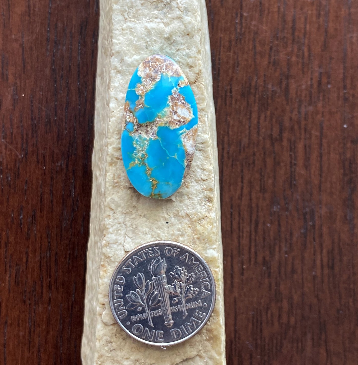 9 carat blue Stone Mountain Turquoise cabochon with red matrix