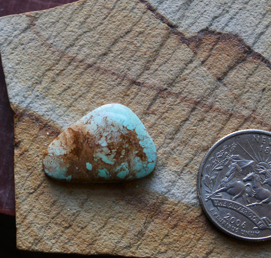 12 carat light blue Stone Mountain Turquoise cabochon with red inclusions 12 carat light blue Stone Mountain Turquoise cabochon with red inclusions