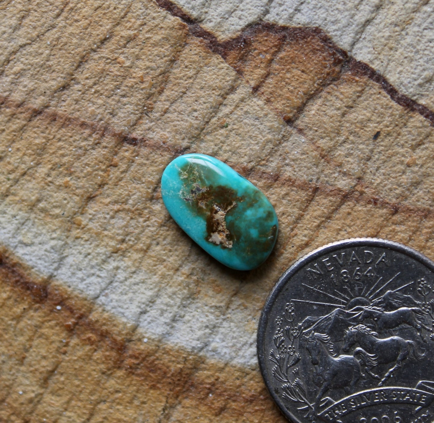 4 carat blue Stone Mountain Turquoise cabochon with red matrix