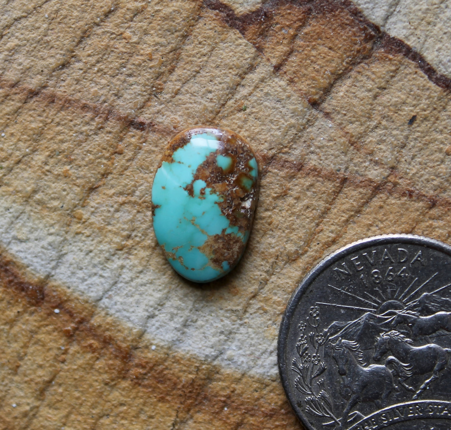 4 carat blue Stone Mountain Turquoise cabochon with red matrix