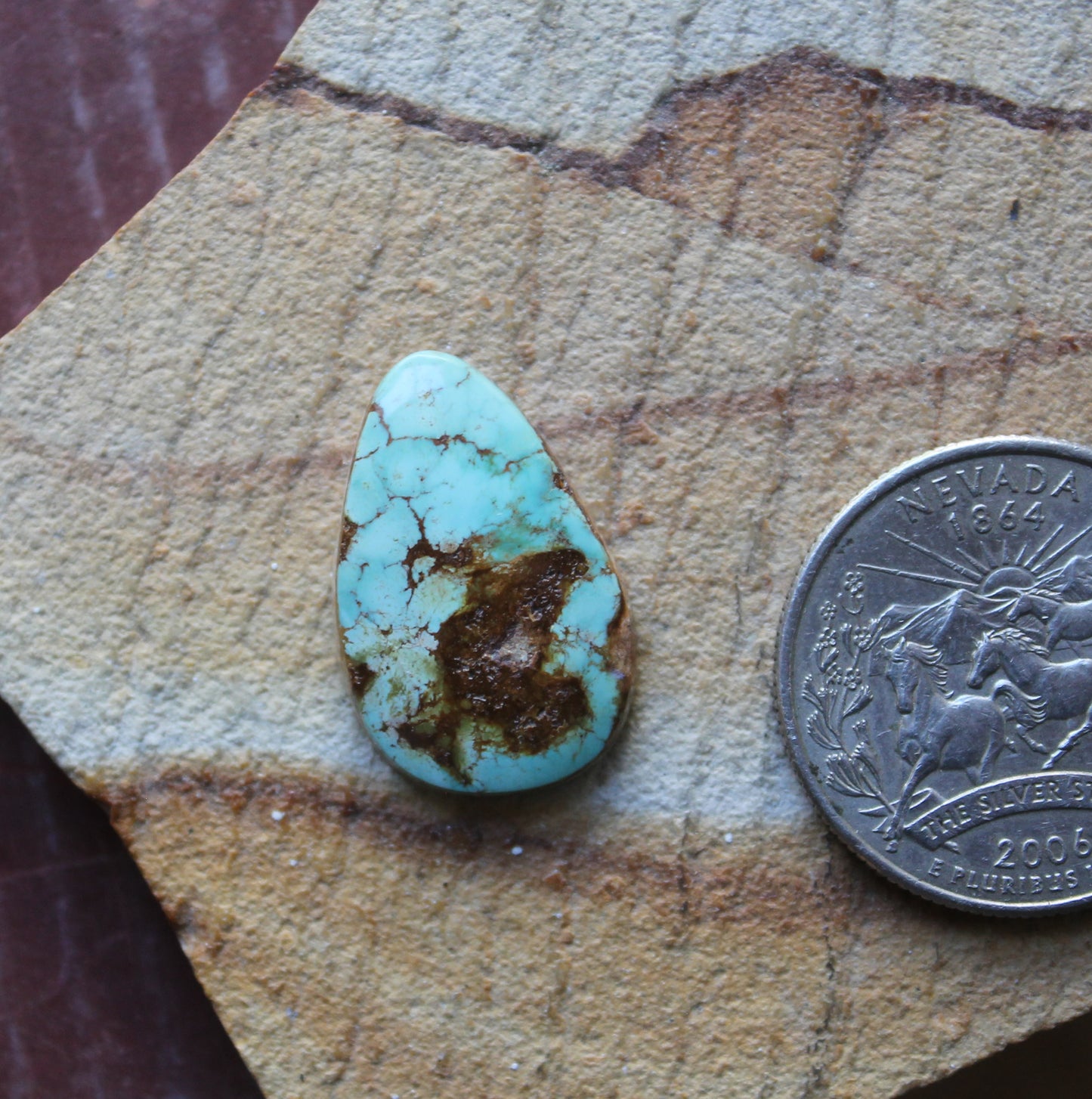 10 carat blue Stone Mountain Turquoise cabochon with red matrix