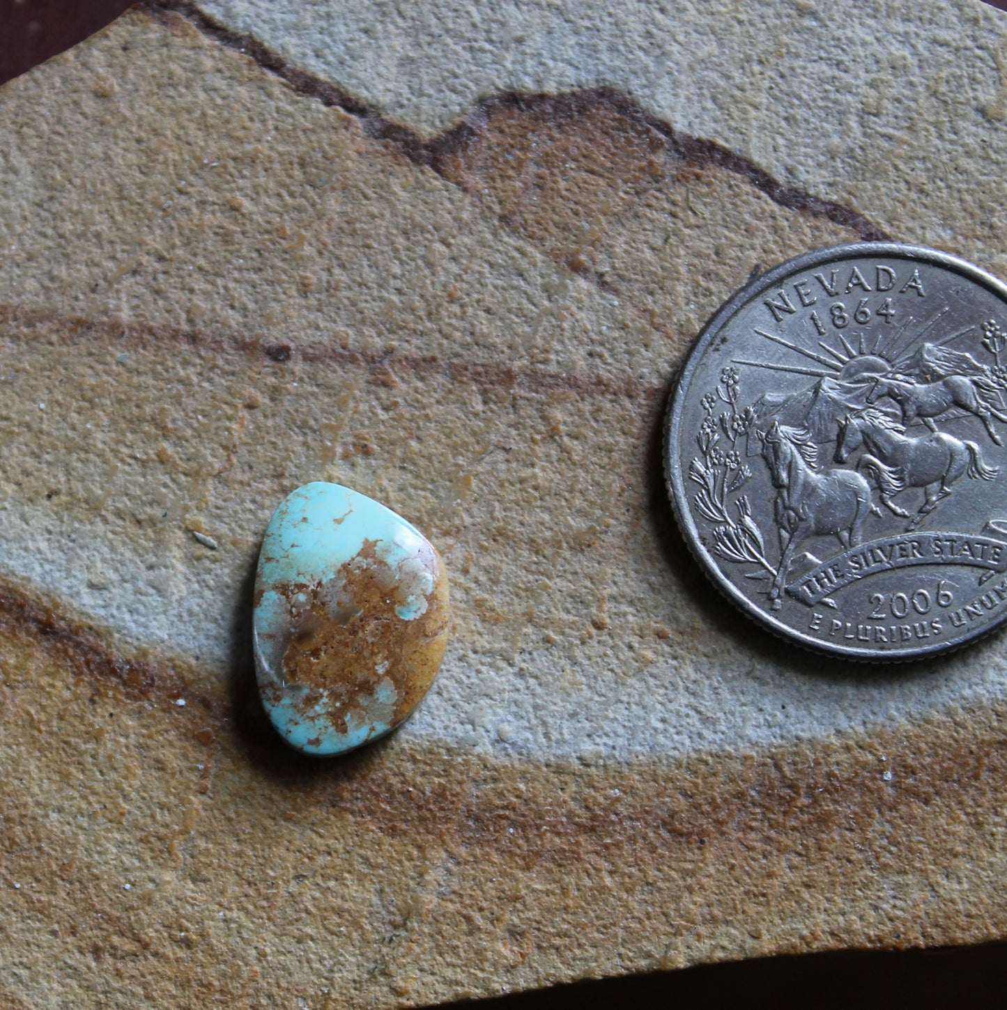 4 carat light blue Stone Mountain Turquoise cabochon with red matrix