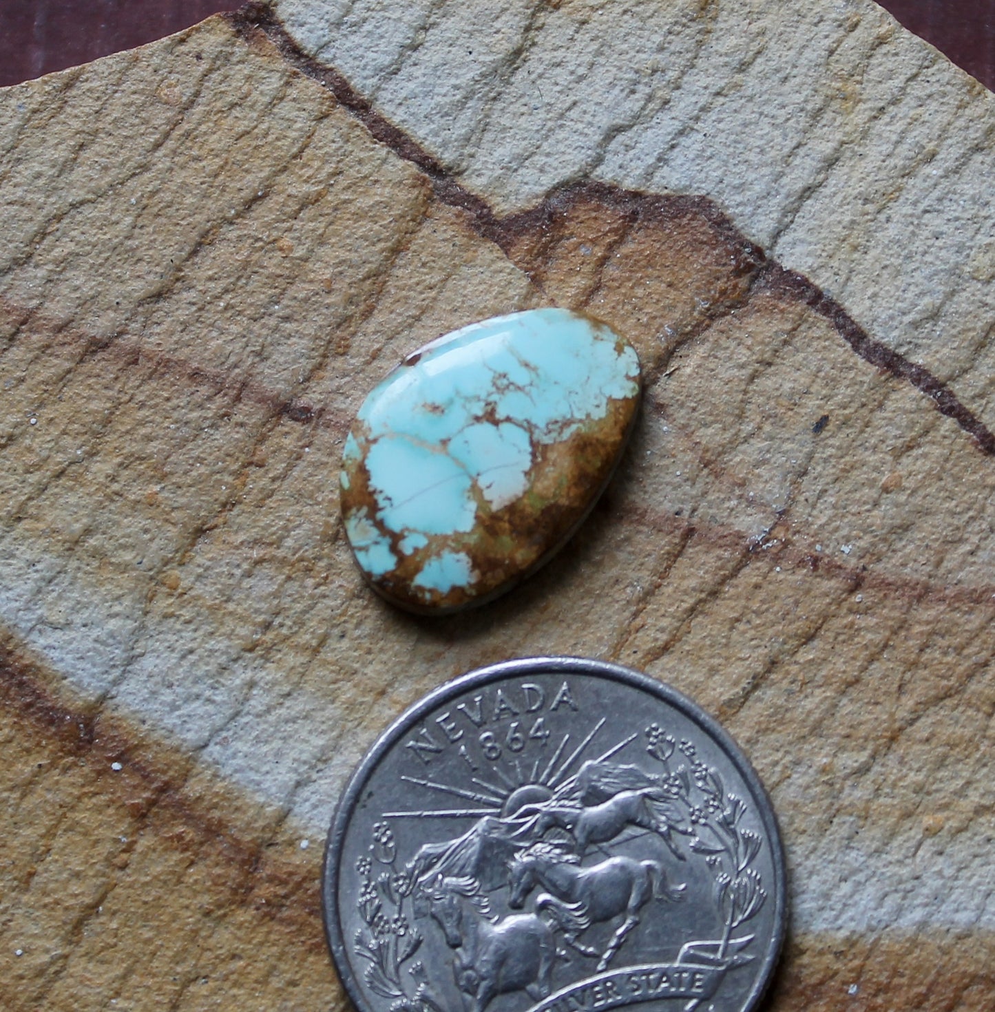 6 carat blue Stone Mountain Turquoise cabochon with red matrix