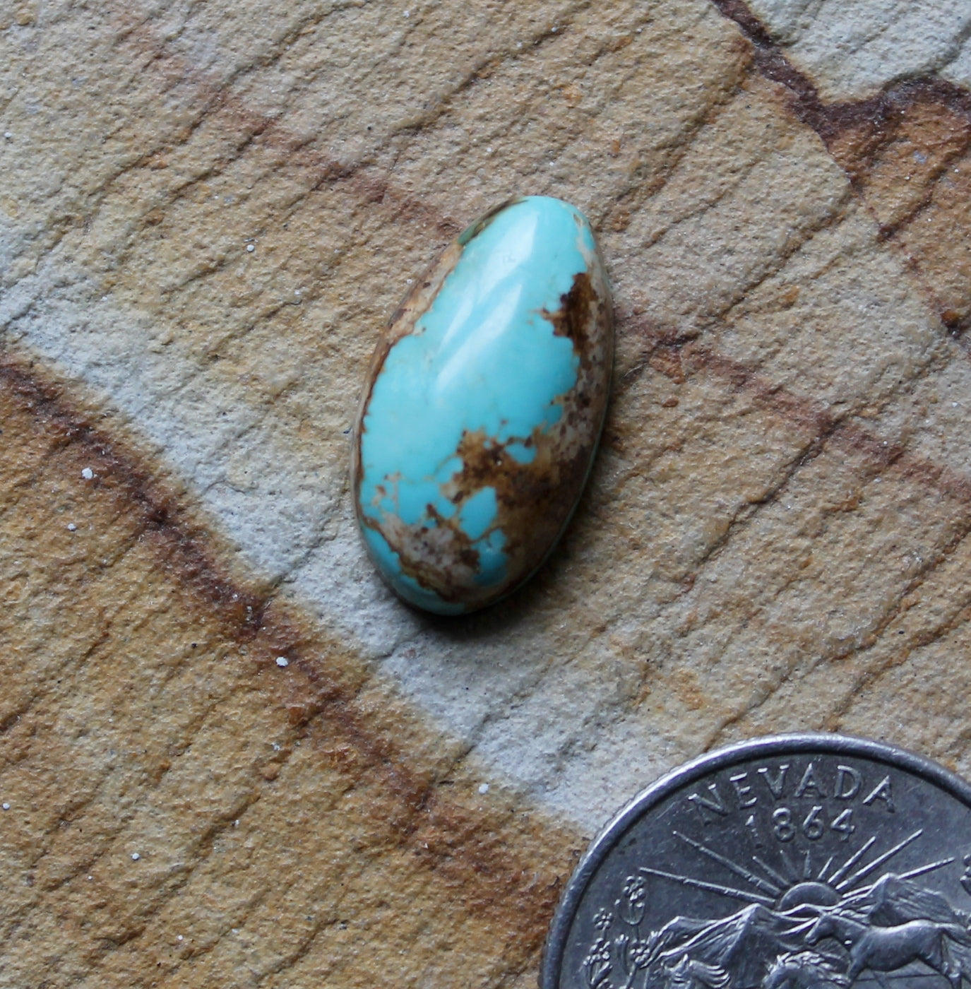 8 carat blue Stone Mountain Turquoise cabochon with red matrix