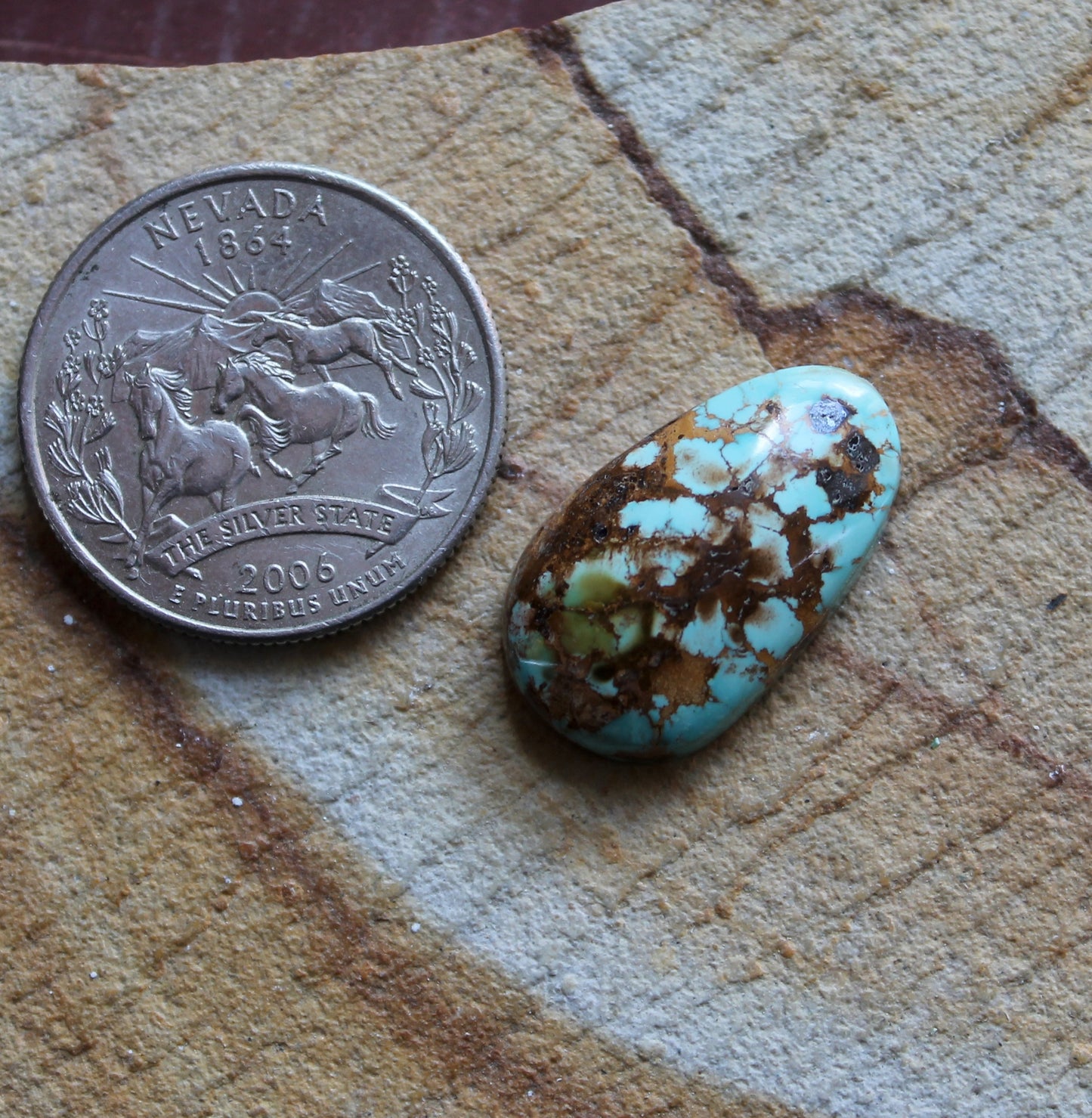11 carat blue Stone Mountain Turquoise cabochon with red matrix