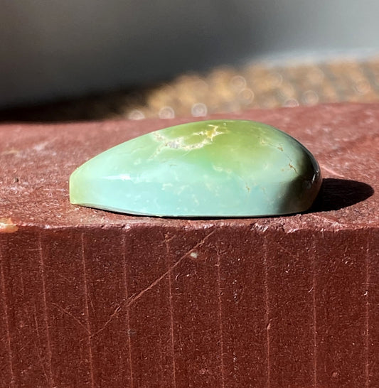 12 carat color change Stone Mountain Turquoise cabochon with a high dome