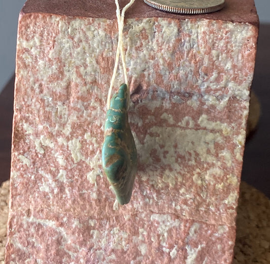 13.6 carat dark green turquoise focal bead from Stone Mountain Mine
