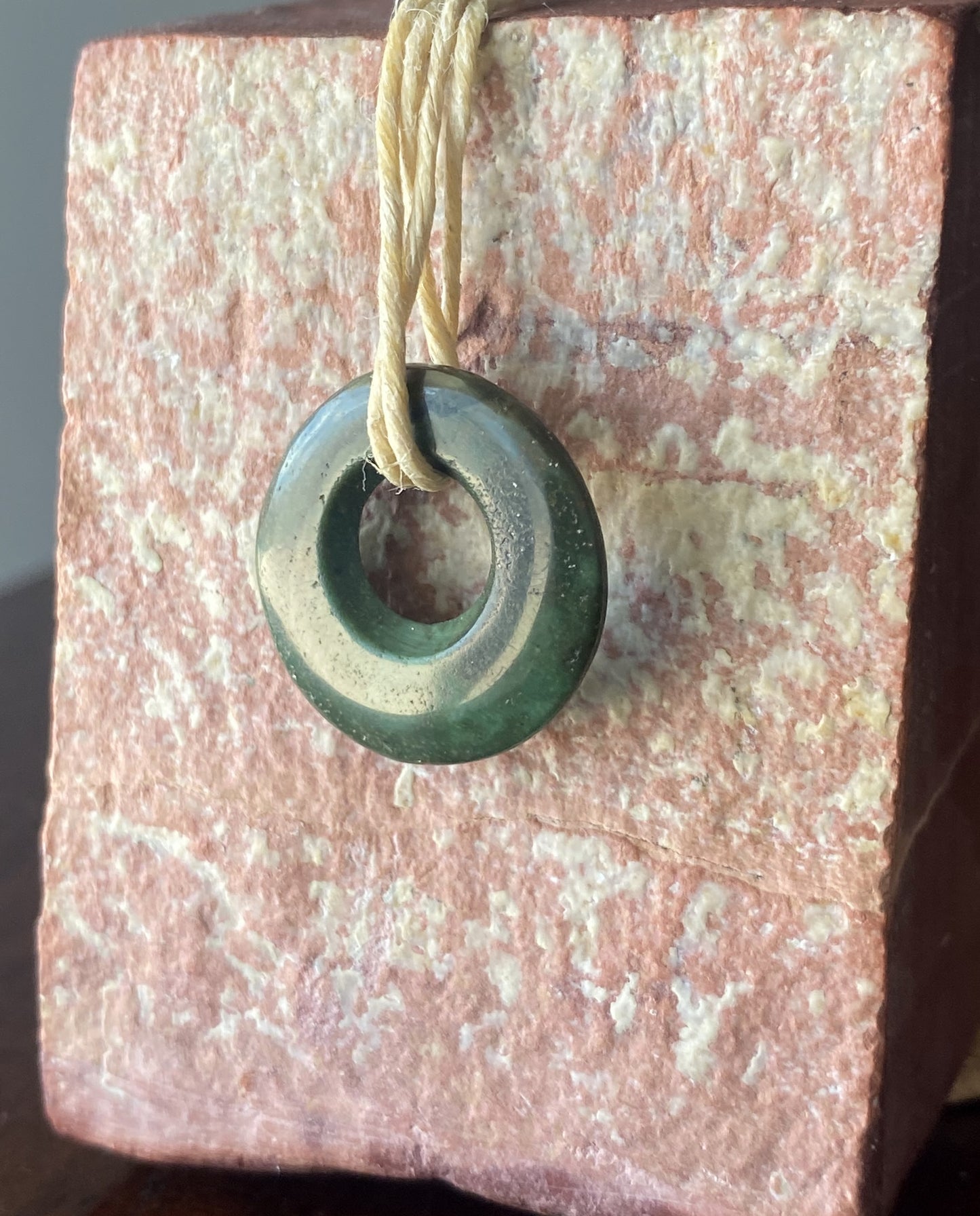 10 carat dark green turquoise disc bead from Stone Mountain Mine