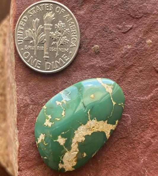 22 carat green Stone Mountain Turquoise cabochon with a high dome