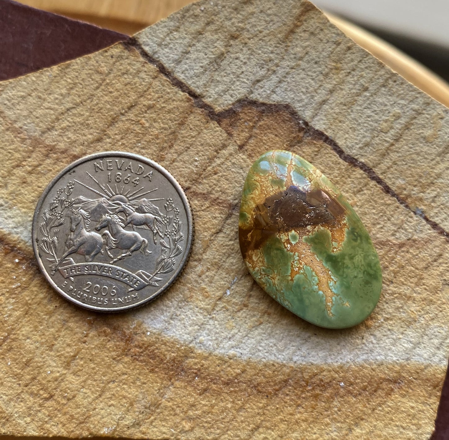 19 carat natural green Stone Mountain Turquoise cabochon with red matrix