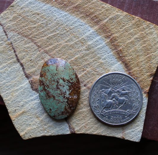 18 carat green Stone Mountain Turquoise cabochon with red matrix 18 carat green Stone Mountain Turquoise cabochon with red matrix