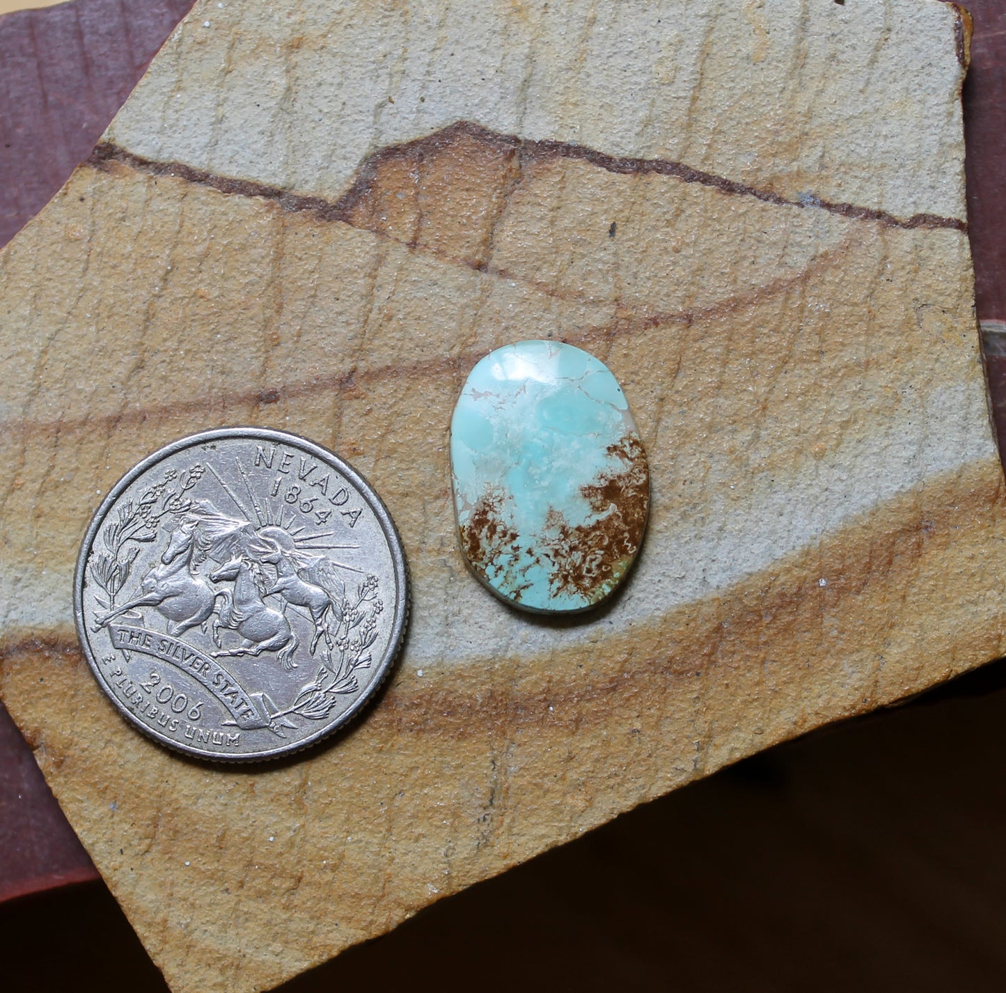6 carat blue Stone Mountain Turquoise cabochon with red matrix