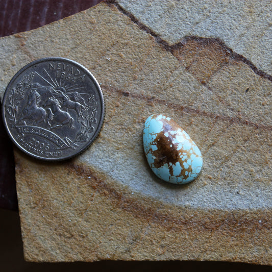 5 carat light blue Stone Mountain Turquoise cabochon with red matrix 5 carat light blue Stone Mountain Turquoise cabochon with red matrix