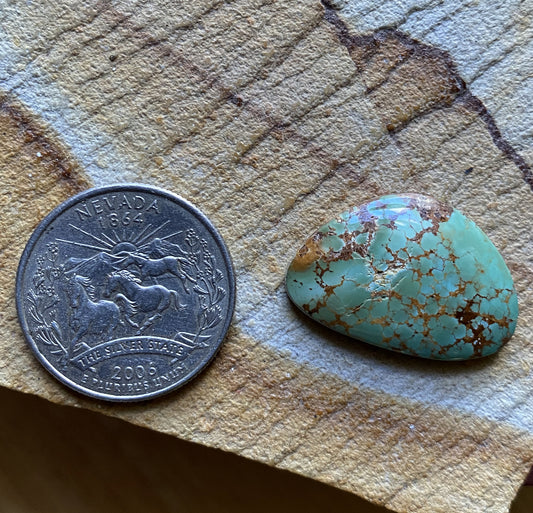 15 carat green Stone Mountain Turquoise cabochon with red matrix 15 carat green Stone Mountain Turquoise cabochon with red matrix