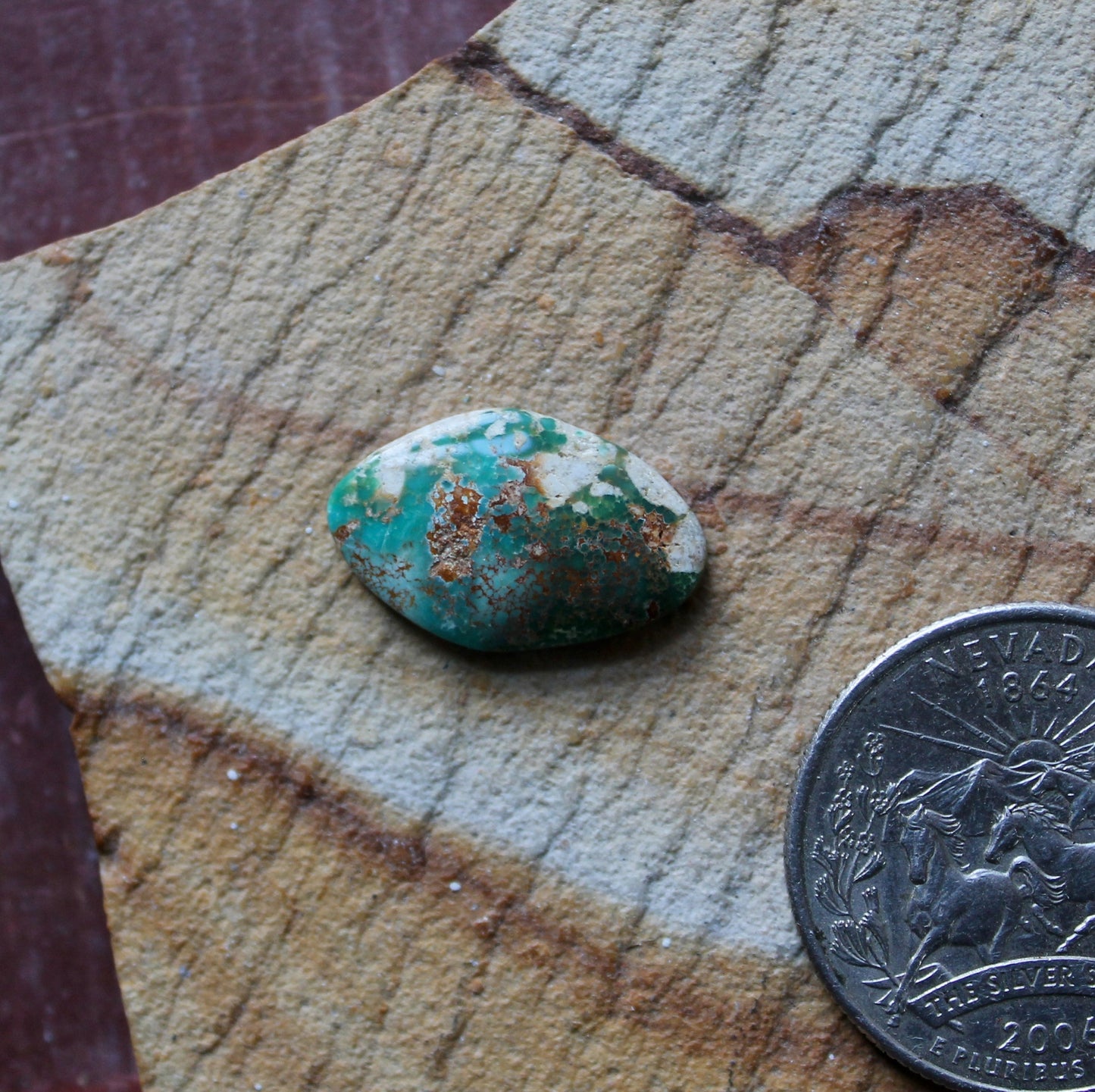 4 carat blue Stone Mountain Turquoise cabochon with red matrix