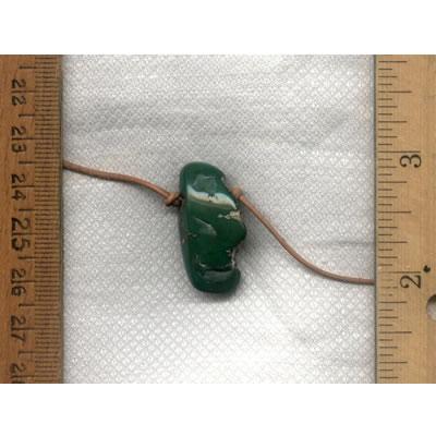 28.5 carat dark green turquoise focal bead from Stone Mountain Mine A thick green Stone Mountain Turquoise focal bead from the Nevada Cassidys