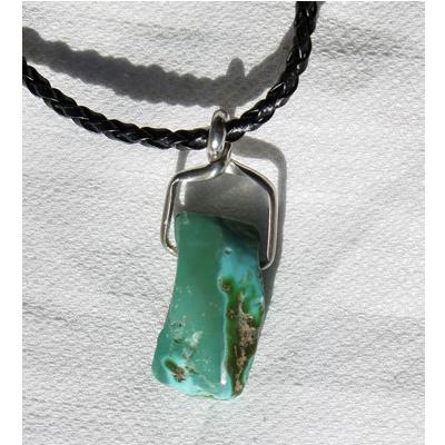 Reversible Multicolor Stone Mountain Turquoise "Character Bead" pendant Here is a lovely reversible character bead pendant using a unique Stone Mountain Turquoise bead from the Nevada Cassidys