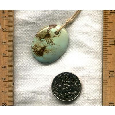 Check out this large light blue turquoise focal bead from Stone Mountain Mine. This stone has a rare red iron pattern.