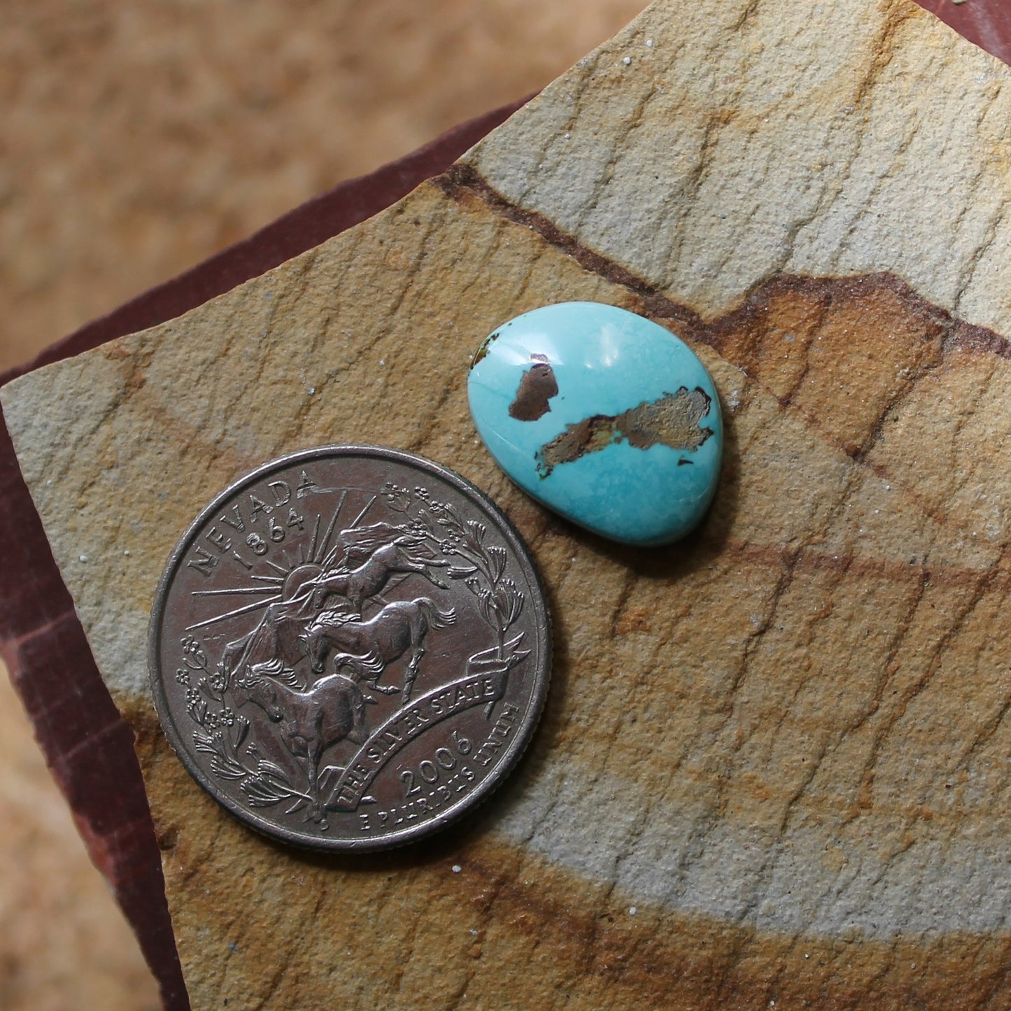 6.5 carat light blue natural Blue June turquoise cabochon with grey-black matrix