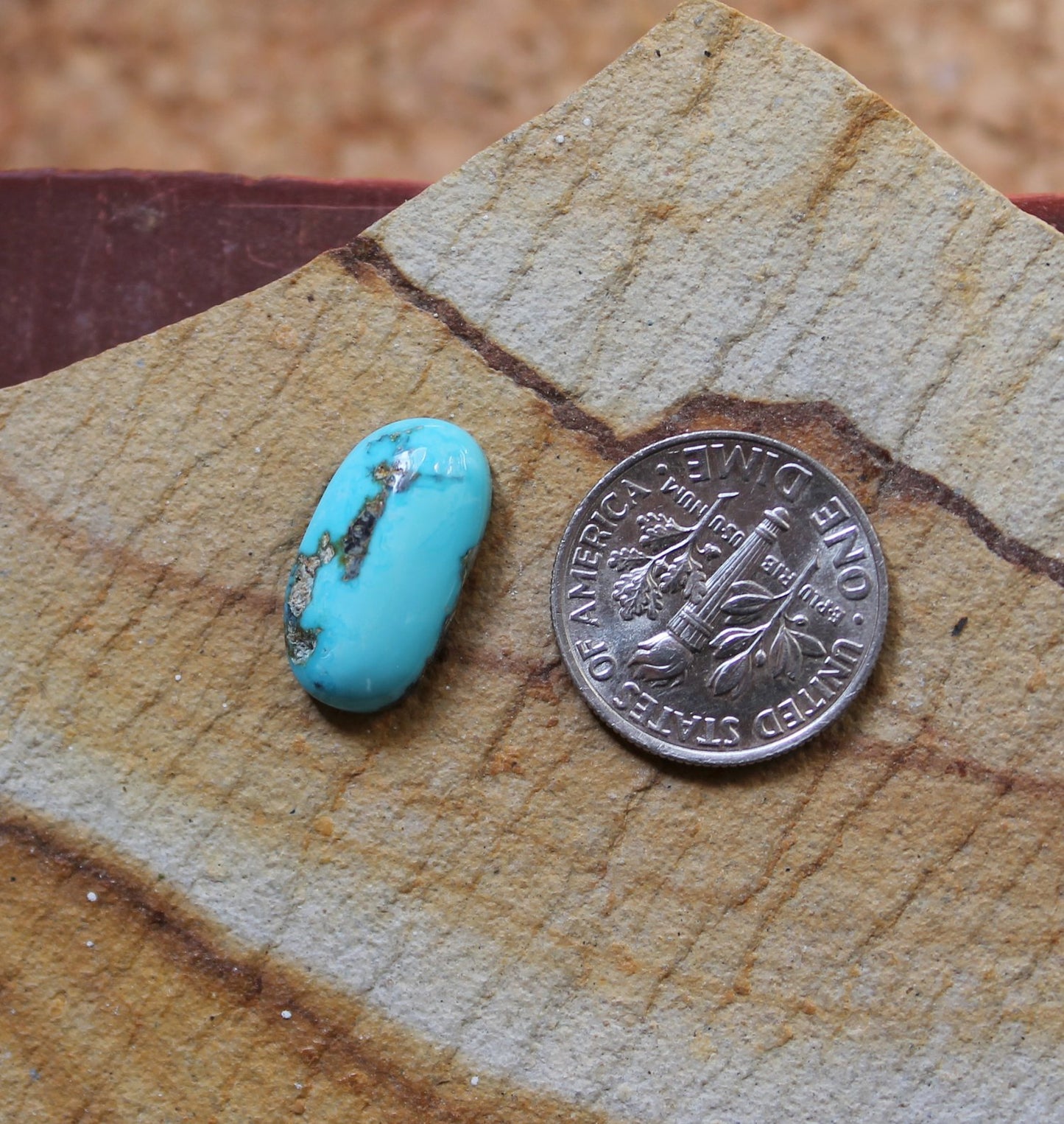 5.6 carat sky blue natural Blue June turquoise cabochon with grey-black matrix