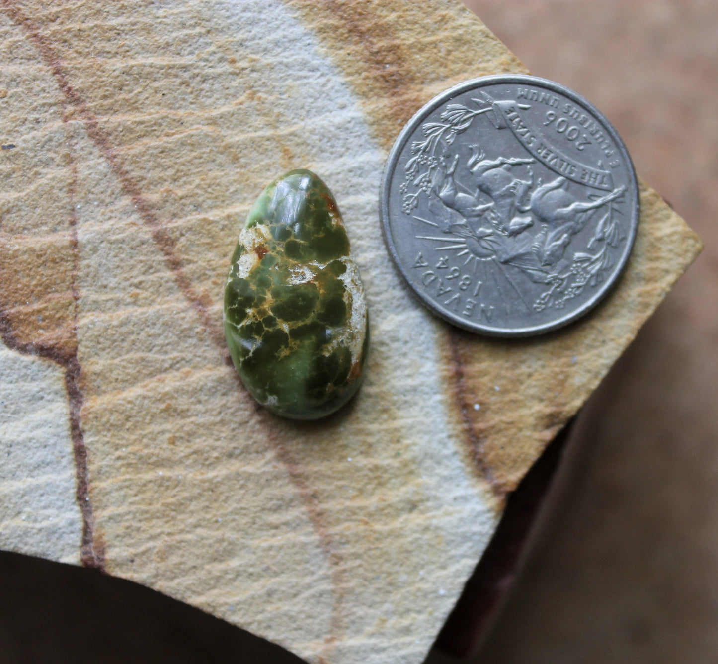 11.5 carat green Stone Mountain Turquoise cabochon with a high dome