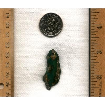 A long green turquoise focal bead from Stone Mountain Mine. This is all natural turquoise from the high deserts of northern Nevada.