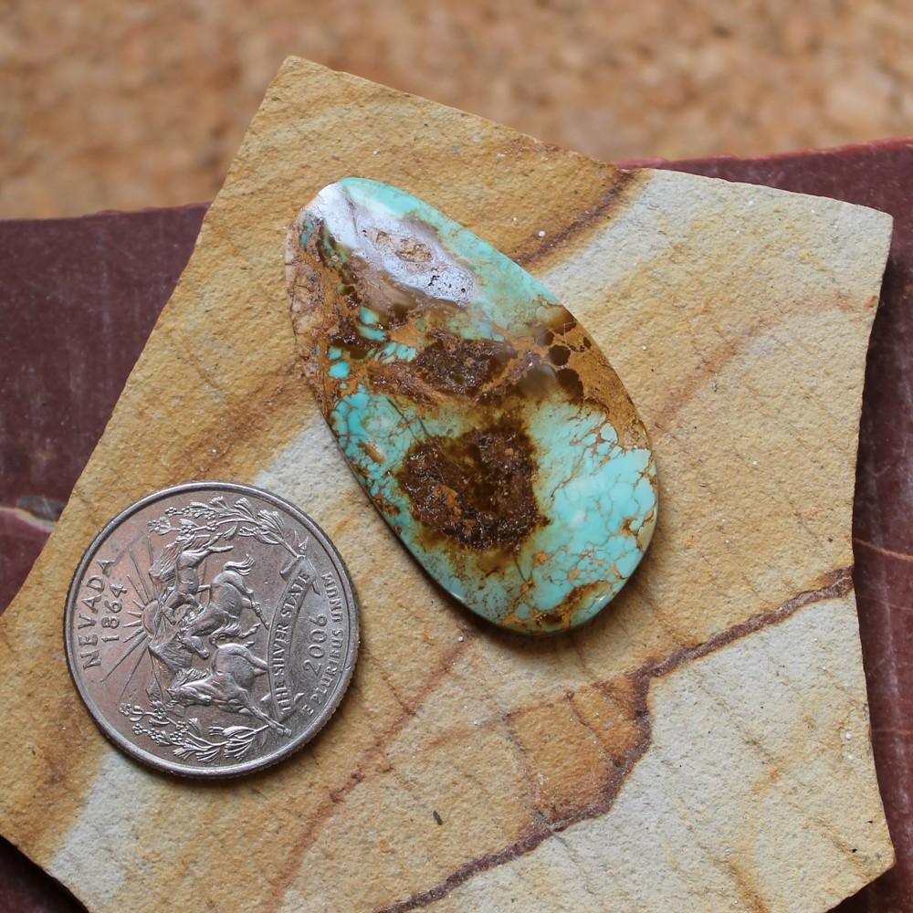 33 carat blue Stone Mountain Turquoise cabochon with red matrix - Nevada Cassidys