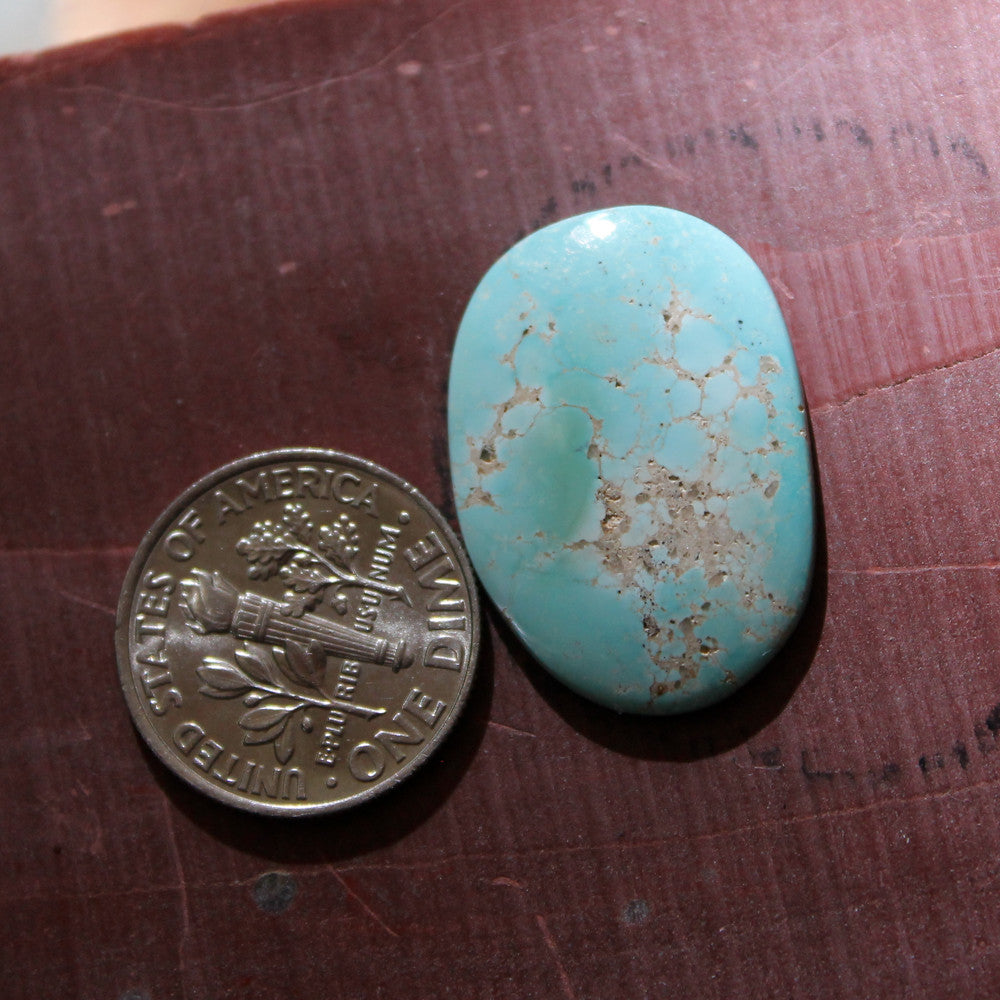 10 carat light blue Stone Mountain Turquoise cabochon with tan matrix