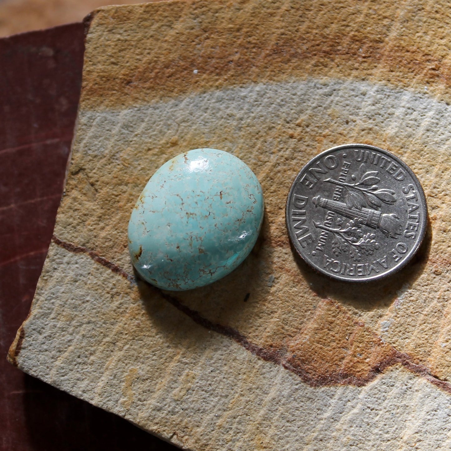 11.2 carat light blue oval Taubert Hills turquoise cabochon