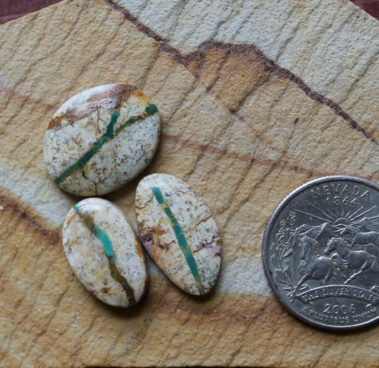 A trio of Green boulder-cut Stone Mountain Turquoise cabochons