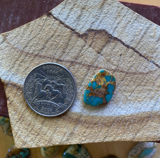 6 carat dark blue Stone Mountain Turquoise cabochon with red matrix