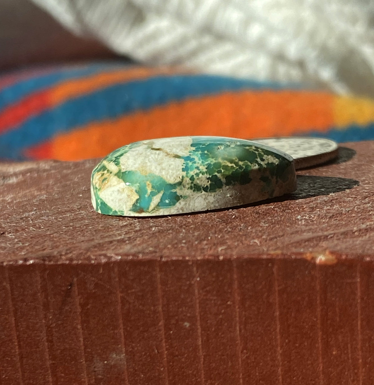 17 carat boulder-cut Stone Mountain Turquoise cabochon with a high dome