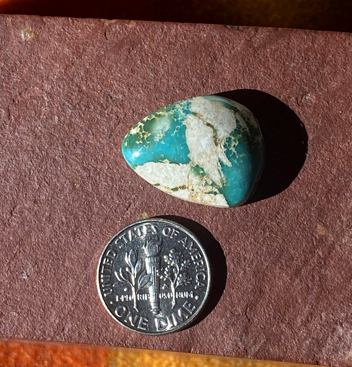 17 carat boulder-cut Stone Mountain Turquoise cabochon with a high dome